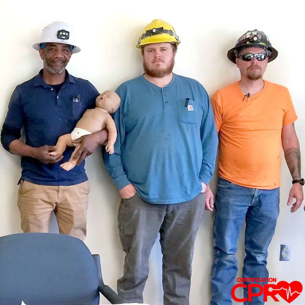 CPR Certification Tampa - Onsite CPR training session with professionals. Learn life-saving skills.