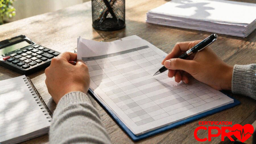 Person filling out a form for CPR certification in Tampa, Florida.